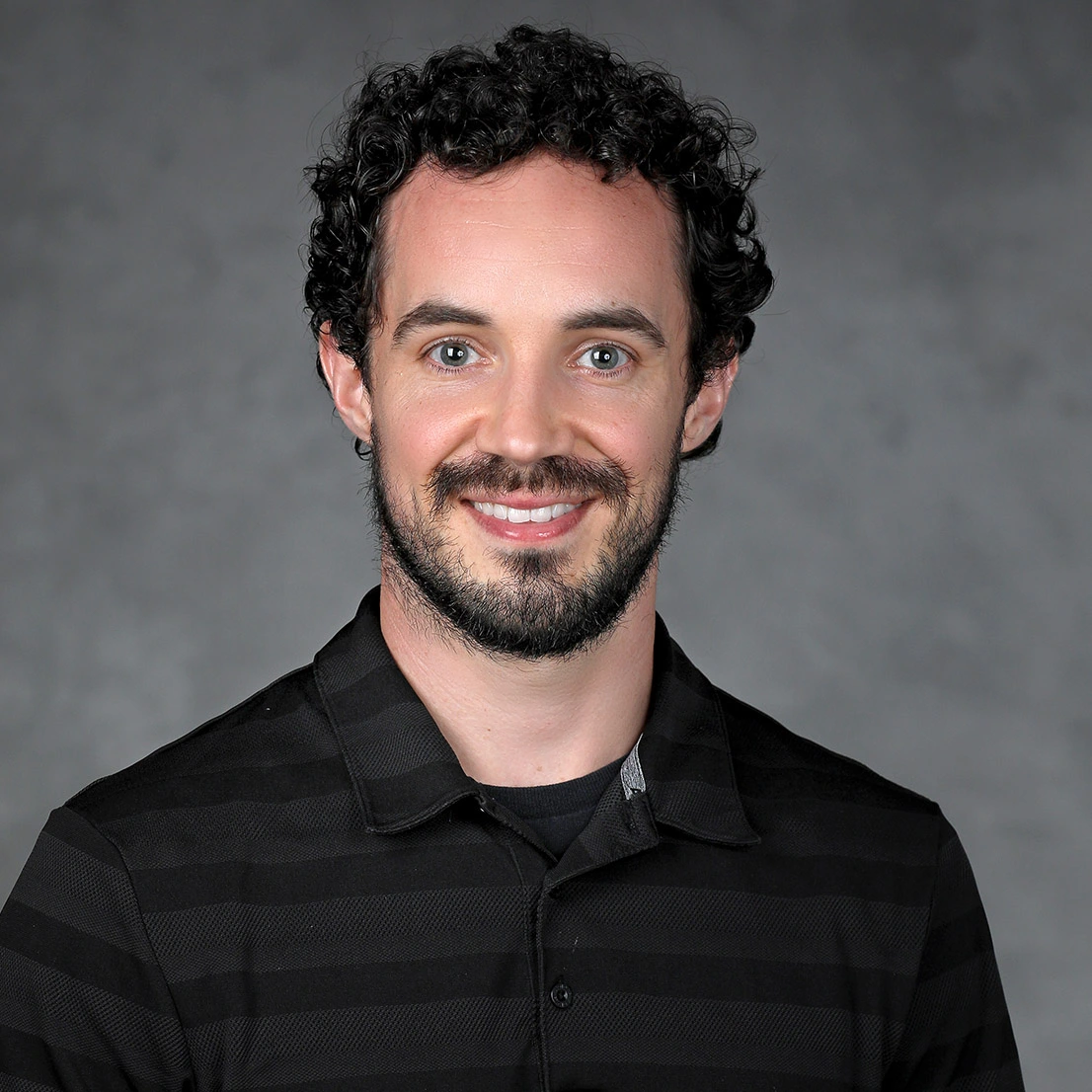 Headshot of Adam Paxton