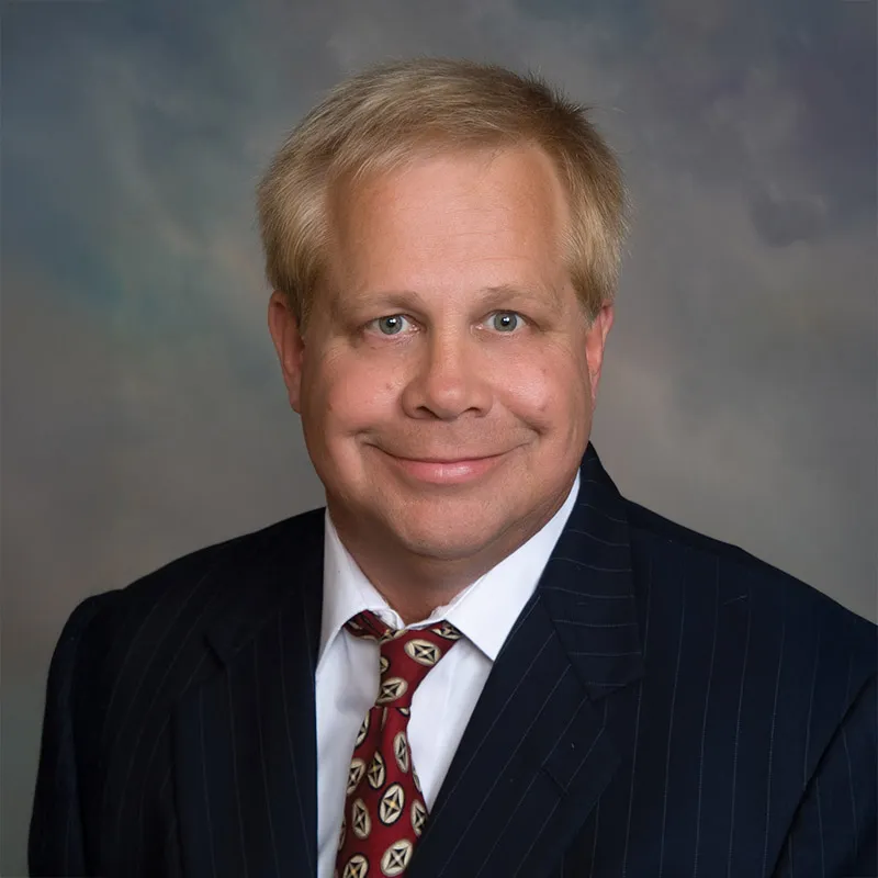 Heashot of J. Allan Hicks