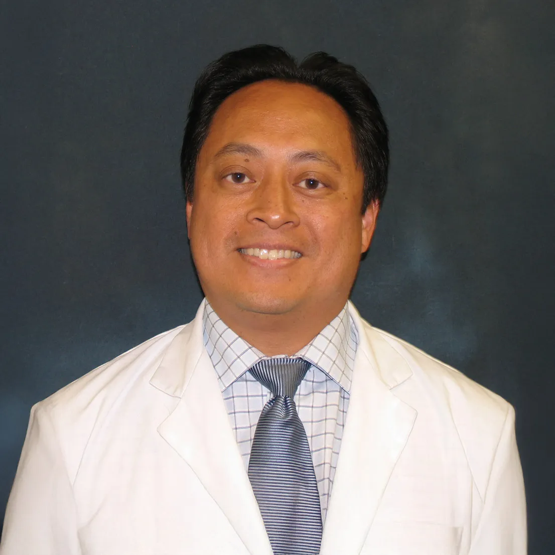 Headshot of John M. Lazaro