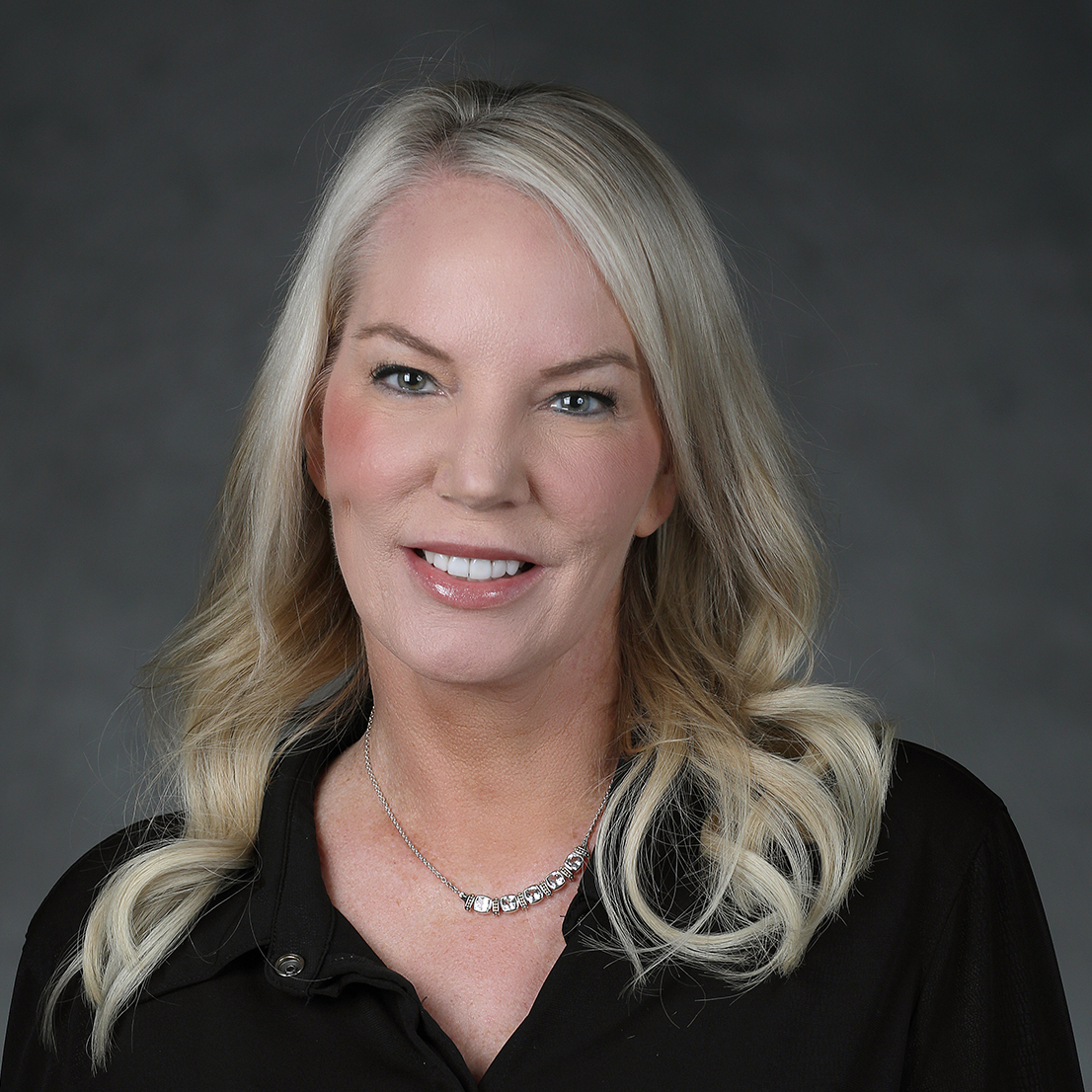 Headshot of Leslie K. West